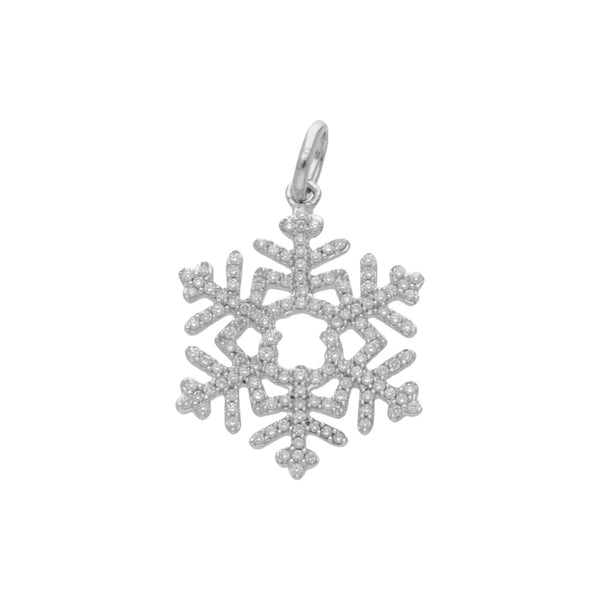 Dije estilizado motivo copo de nieve con diamantes firma Tous en oro blanco 18 kilates.