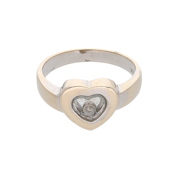 Anillo diseño especial motivo corazón con diamante en oro blanco 18 kilates.