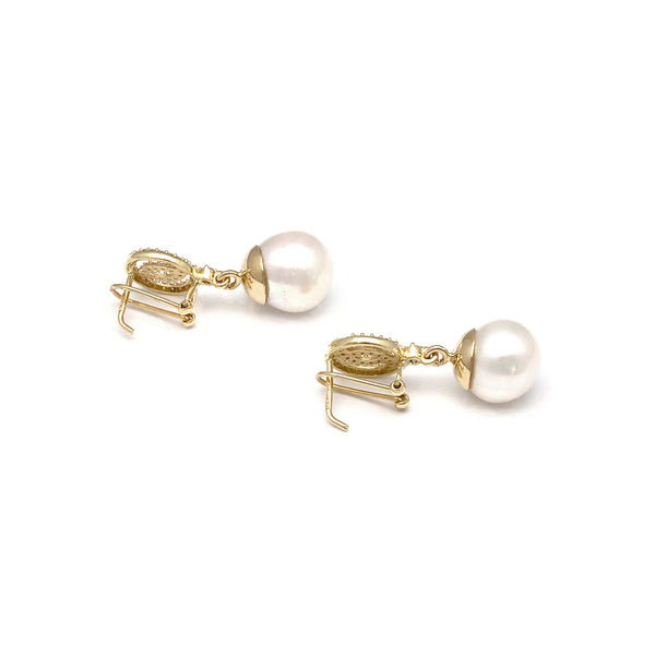 Aretes calados con perlas y circonias en oro amarillo 14 kilates.