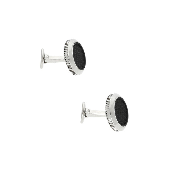 Mancuernillas hechura especial con caucho firma Breguet en oro blanco 18 kilates.