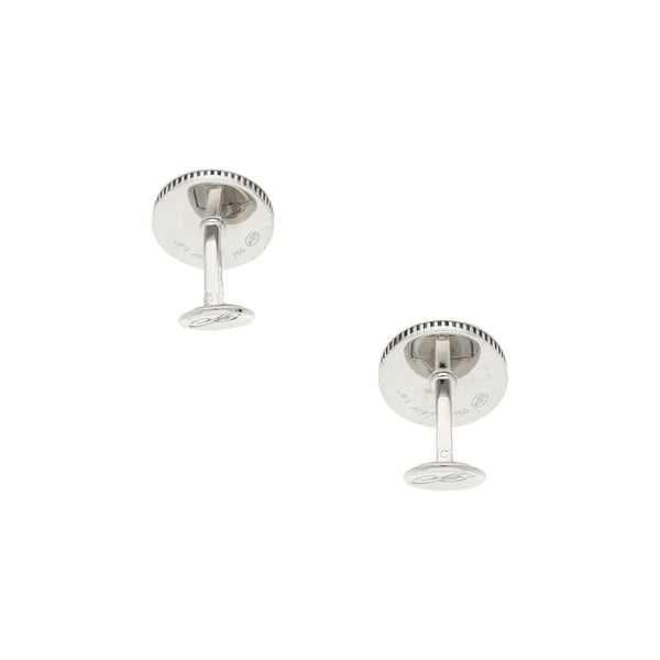 Mancuernillas hechura especial con caucho firma Breguet en oro blanco 18 kilates.