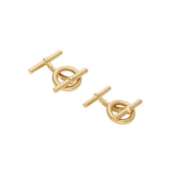 Mancuernillas estilizadas firma Hermes en oro amarillo 18 kilates.