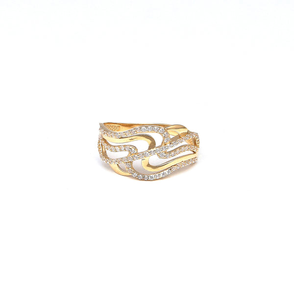 Anillo estilizado con circonias en oro amarillo 14 kilates.